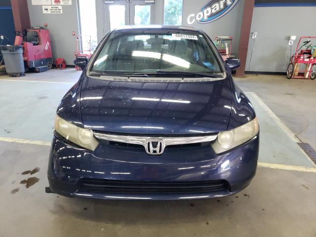 Photo 4 VIN: 1HGFA16527L115709 - HONDA CIVIC LX 