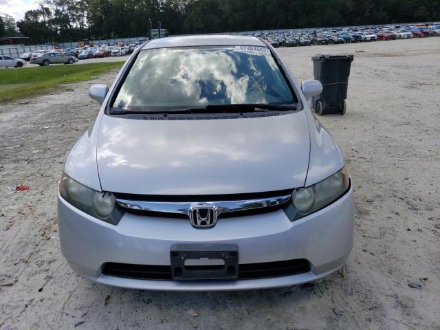 Photo 4 VIN: 1HGFA16557L062620 - HONDA CIVIC LX 