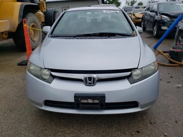 Photo 4 VIN: 1HGFA16557L065484 - HONDA CIVIC LX 