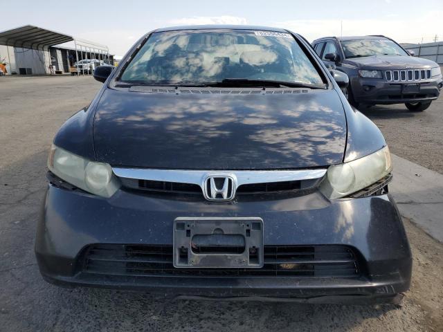 Photo 4 VIN: 1HGFA16567L007805 - HONDA CIVIC LX 