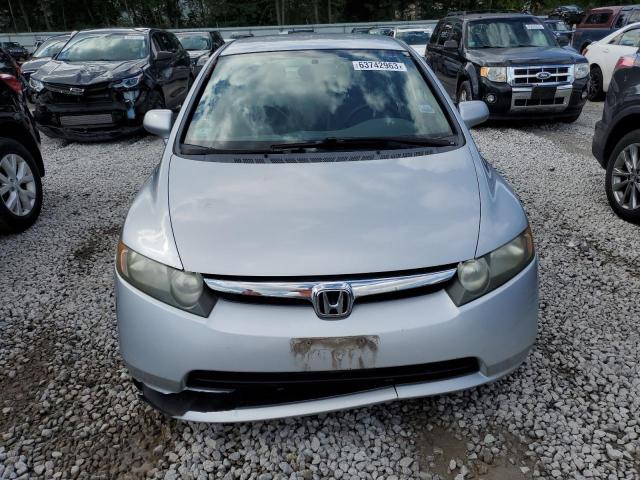 Photo 4 VIN: 1HGFA16567L027908 - HONDA CIVIC LX 