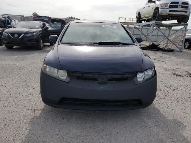 Photo 4 VIN: 1HGFA16567L105877 - HONDA CIVIC LX 