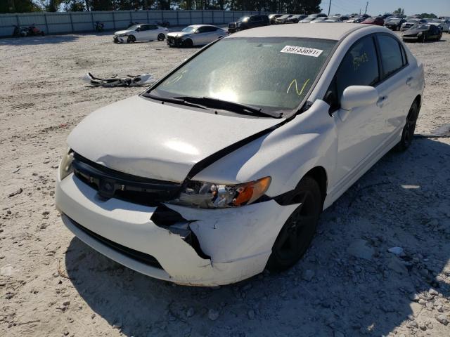 Photo 1 VIN: 1HGFA16567L109590 - HONDA CIVIC LX 