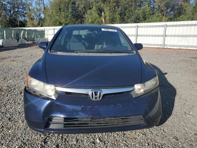 Photo 4 VIN: 1HGFA16567L123943 - HONDA CIVIC LX 