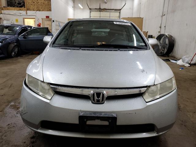 Photo 4 VIN: 1HGFA16587L129310 - HONDA CIVIC LX 