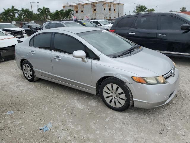 Photo 3 VIN: 1HGFA165X6L066483 - HONDA CIVIC LX 