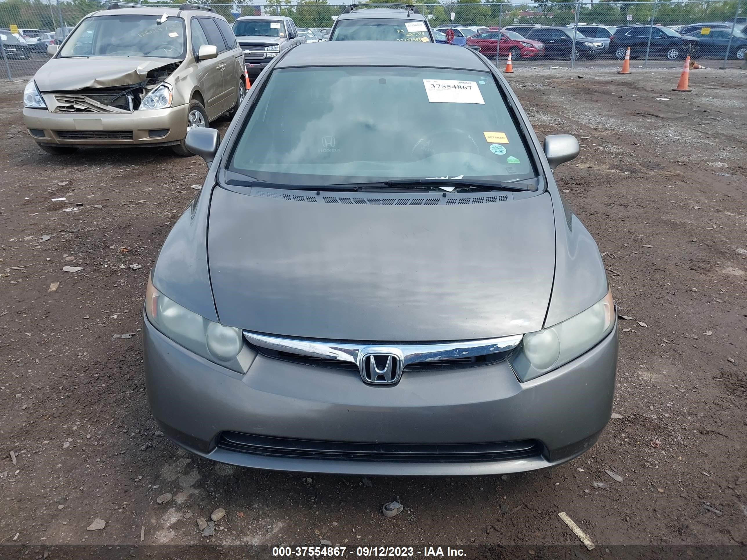 Photo 11 VIN: 1HGFA165X6L086264 - HONDA CIVIC 