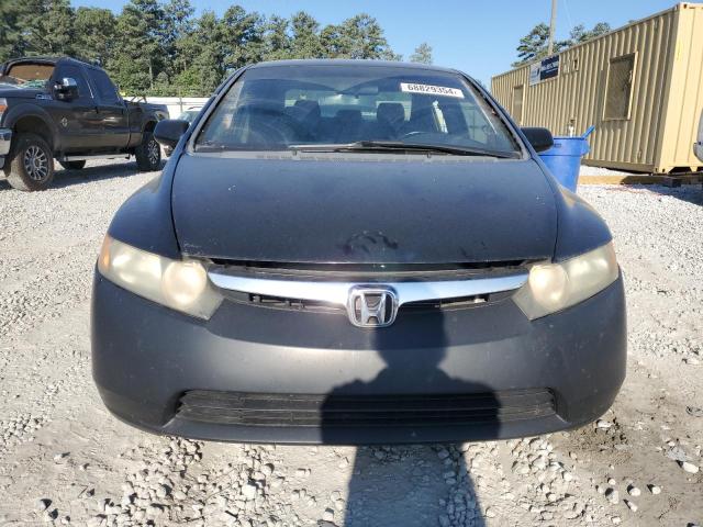 Photo 4 VIN: 1HGFA165X7L028639 - HONDA CIVIC LX 