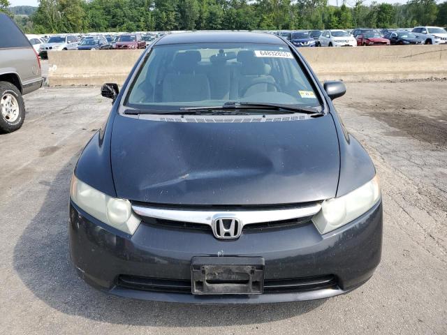 Photo 4 VIN: 1HGFA165X7L043304 - HONDA CIVIC LX 