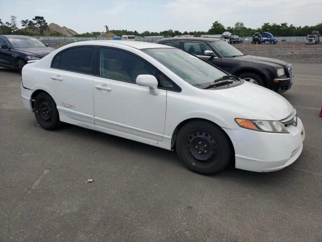 Photo 3 VIN: 1HGFA165X7L065917 - HONDA CIVIC LX 