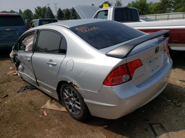 Photo 1 VIN: 1HGFA165X7L066484 - HONDA CIVIC LX 