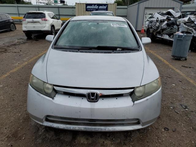 Photo 4 VIN: 1HGFA165X7L121628 - HONDA CIVIC LX 