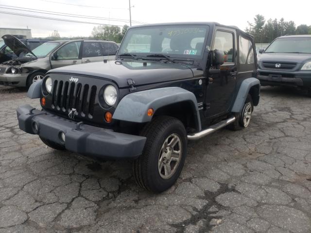 Photo 1 VIN: 1J4AA2D11BL591600 - JEEP WRANGLER S 