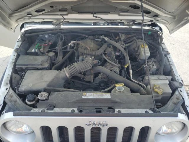 Photo 10 VIN: 1J4AA2D14BL527518 - JEEP WRANGLER S 