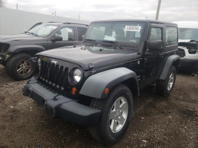 Photo 1 VIN: 1J4AA2D14BL573933 - JEEP WRANGLER S 