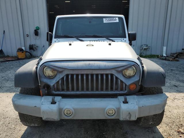 Photo 4 VIN: 1J4AA2D1XBL501442 - JEEP WRANGLER S 