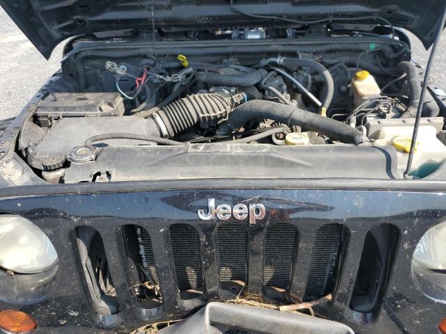 Photo 10 VIN: 1J4AA2D1XBL570213 - JEEP WRANGLER S 