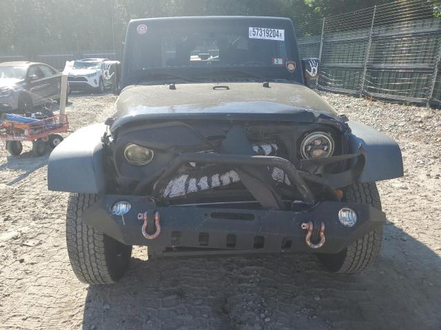 Photo 4 VIN: 1J4AA2D1XBL570874 - JEEP WRANGLER S 