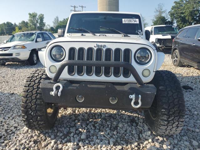 Photo 4 VIN: 1J4AA5D19BL576277 - JEEP WRANGLER S 