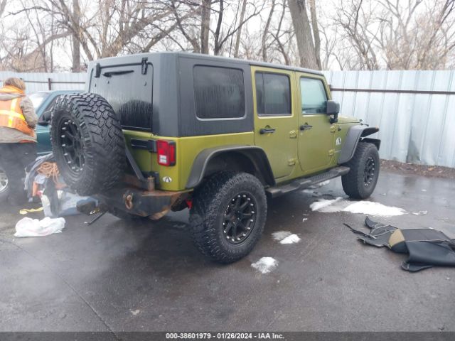 Photo 3 VIN: 1J4BA3H11AL216079 - JEEP WRANGLER UNLIMITED 