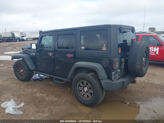 Photo 2 VIN: 1J4BA3H11BL614197 - JEEP WRANGLER UNLIMITED 