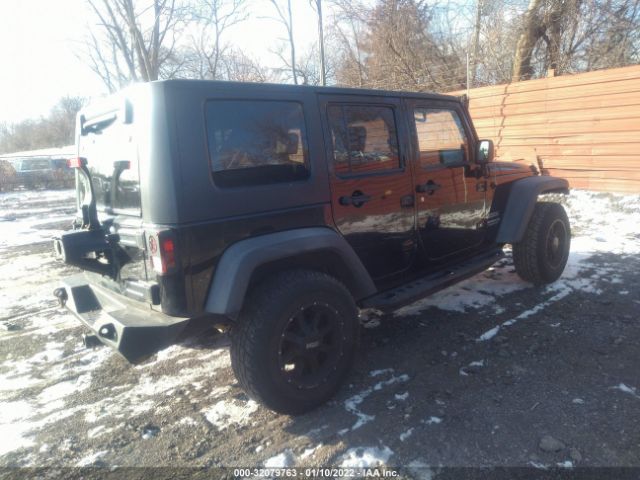 Photo 3 VIN: 1J4BA3H12AL127279 - JEEP WRANGLER UNLIMITED 