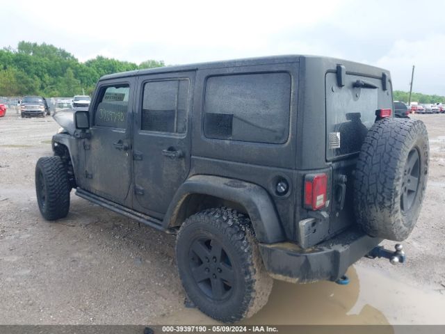 Photo 2 VIN: 1J4BA3H12BL518997 - JEEP WRANGLER UNLIMITED 