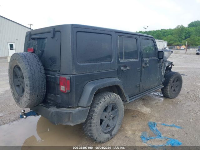 Photo 3 VIN: 1J4BA3H12BL518997 - JEEP WRANGLER UNLIMITED 