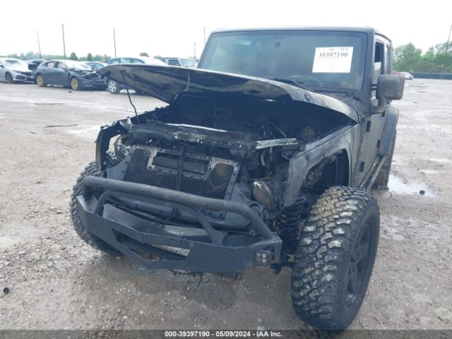 Photo 5 VIN: 1J4BA3H12BL518997 - JEEP WRANGLER UNLIMITED 