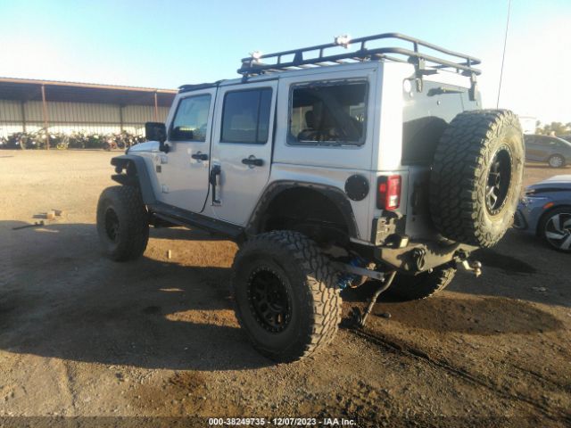 Photo 2 VIN: 1J4BA3H16AL182060 - JEEP WRANGLER UNLIMITED 