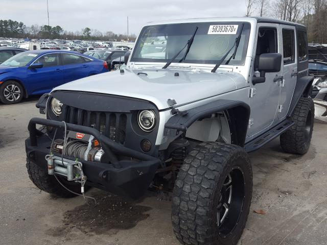 Photo 1 VIN: 1J4BA3H17AL112874 - JEEP WRANGLER U 