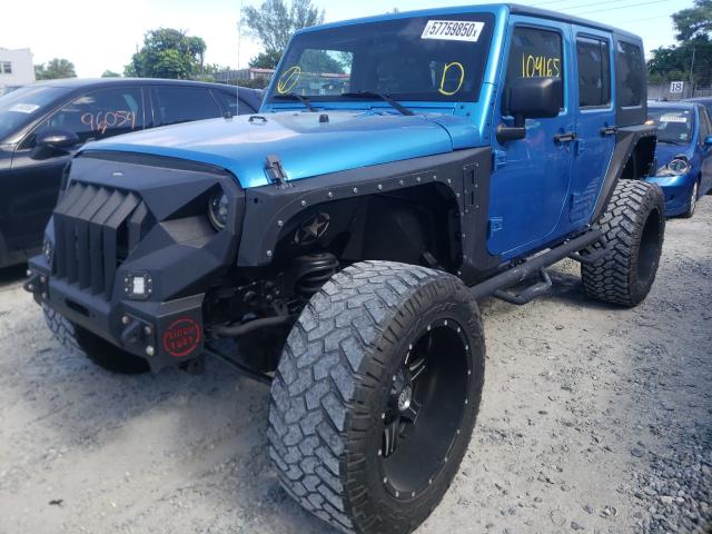 Photo 1 VIN: 1J4BA3H18AL189804 - JEEP WRANGLER U 