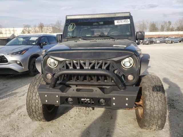 Photo 4 VIN: 1J4BA3H18AL211297 - JEEP WRANGLER U 