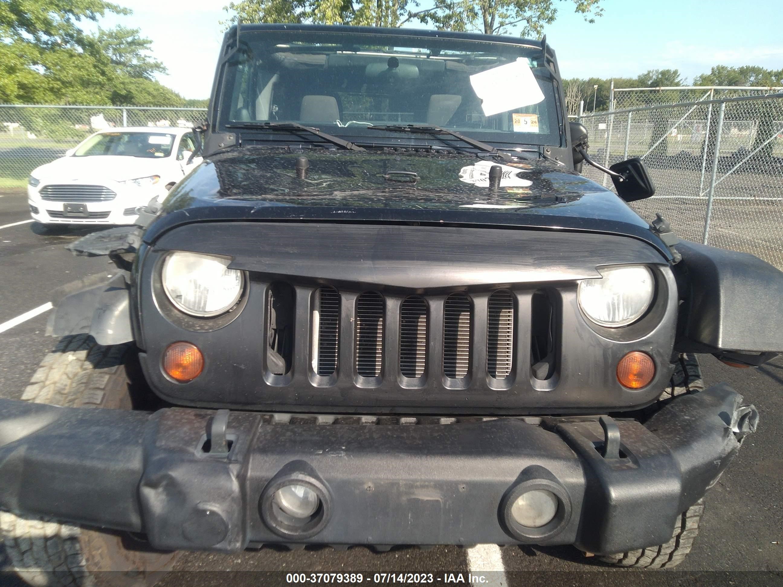 Photo 11 VIN: 1J4BA3H18BL524304 - JEEP WRANGLER 