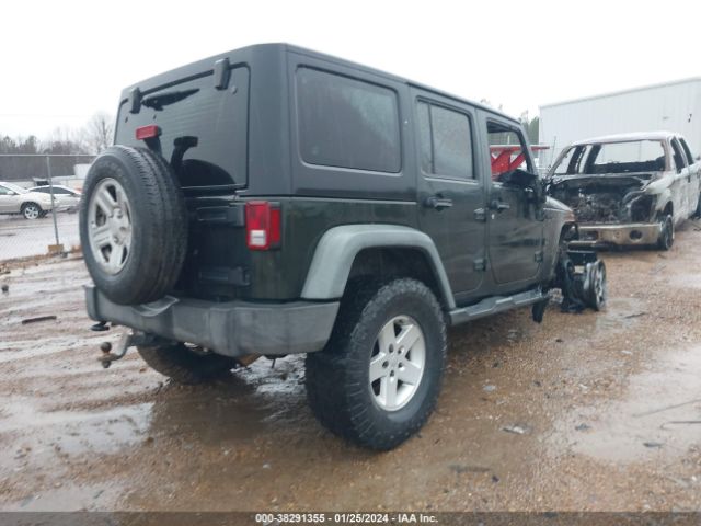 Photo 3 VIN: 1J4BA3H1XBL514745 - JEEP WRANGLER UNLIMITED 