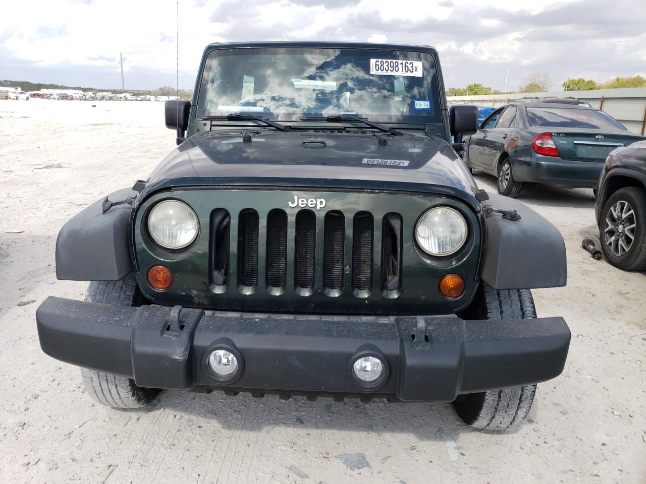 Photo 4 VIN: 1J4BA3H1XBL565047 - JEEP WRANGLER 