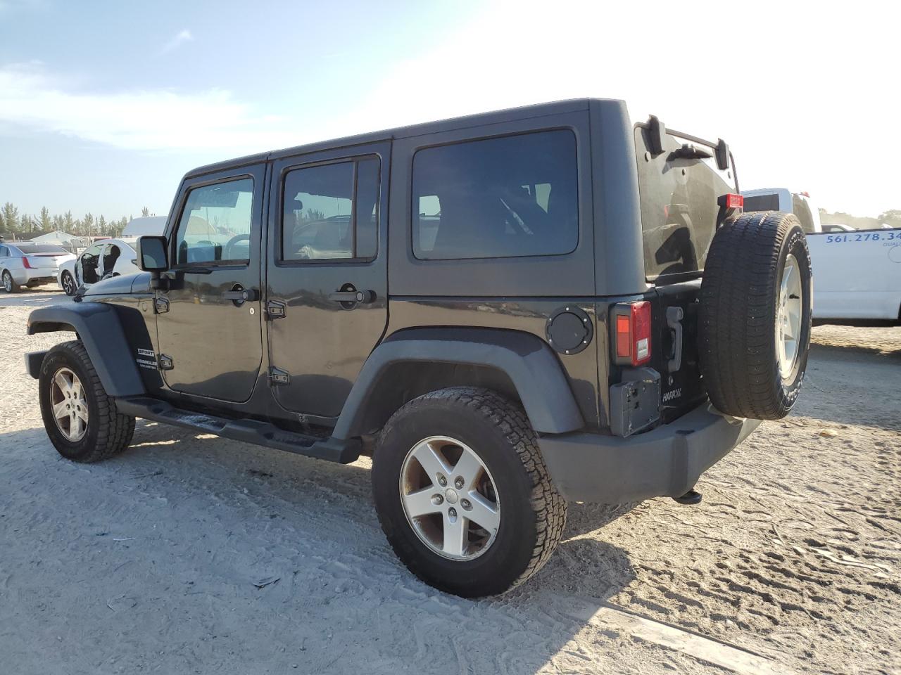 Photo 1 VIN: 1J4BA3H1XBL586450 - JEEP WRANGLER 