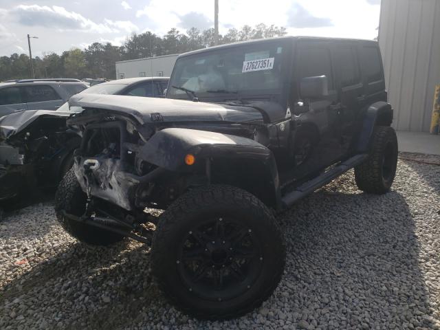 Photo 1 VIN: 1J4BA3H1XBL600654 - JEEP WRANGLER U 