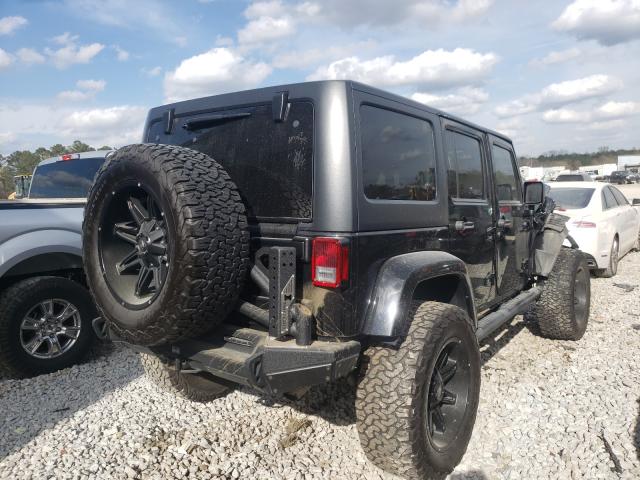 Photo 3 VIN: 1J4BA3H1XBL600654 - JEEP WRANGLER U 