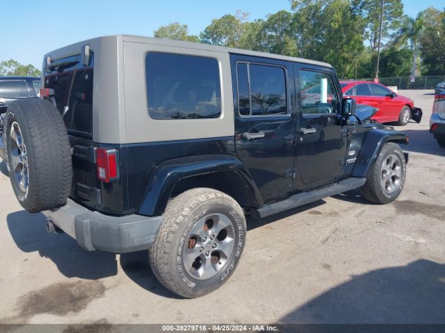 Photo 3 VIN: 1J4BA5H11AL101185 - JEEP WRANGLER UNLIMITED 