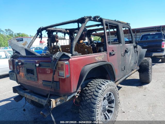 Photo 3 VIN: 1J4BA5H11AL202517 - JEEP WRANGLER UNLIMITED 