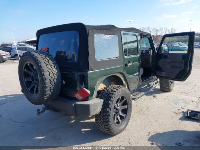 Photo 3 VIN: 1J4BA5H13AL197806 - JEEP WRANGLER UNLIMITED 