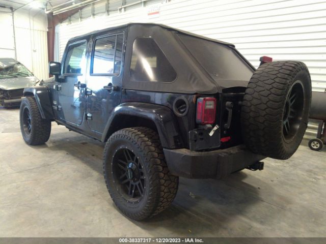 Photo 2 VIN: 1J4BA5H13BL506417 - JEEP WRANGLER UNLIMITED 