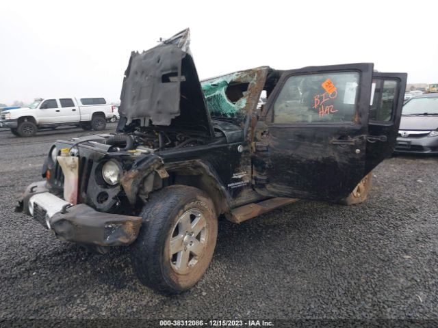 Photo 1 VIN: 1J4BA5H14BL551401 - JEEP WRANGLER UNLIMITED 