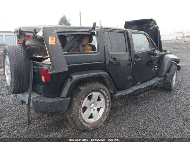 Photo 3 VIN: 1J4BA5H14BL551401 - JEEP WRANGLER UNLIMITED 