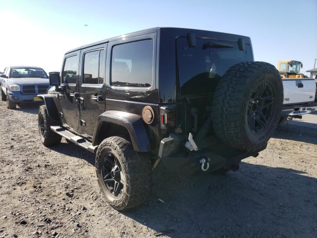 Photo 2 VIN: 1J4BA5H15BL570703 - JEEP WRANGLER U 