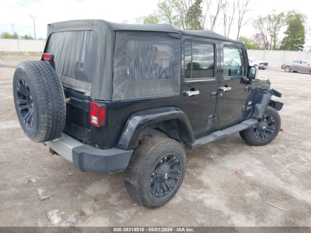 Photo 3 VIN: 1J4BA5H18BL568766 - JEEP WRANGLER UNLIMITED 