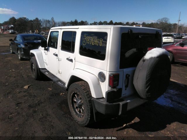 Photo 2 VIN: 1J4BA5H18BL633602 - JEEP WRANGLER UNLIMITED 