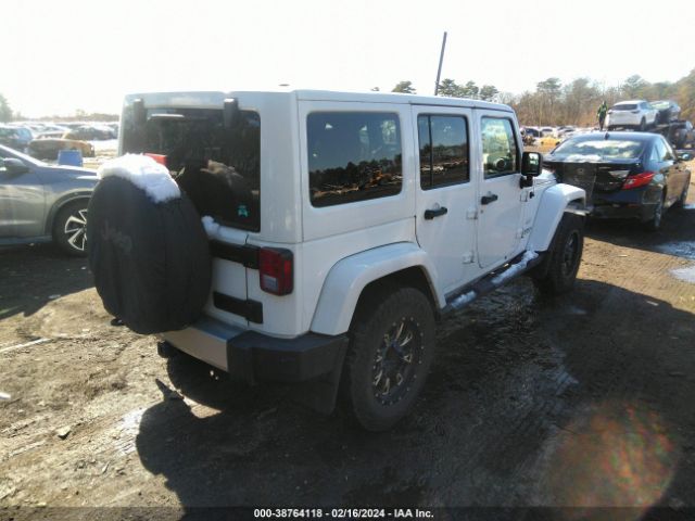 Photo 3 VIN: 1J4BA5H18BL633602 - JEEP WRANGLER UNLIMITED 