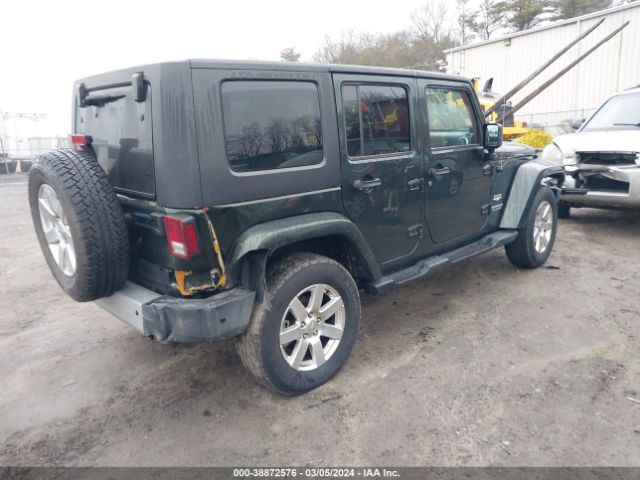 Photo 3 VIN: 1J4BA5H19AL215306 - JEEP WRANGLER UNLIMITED 